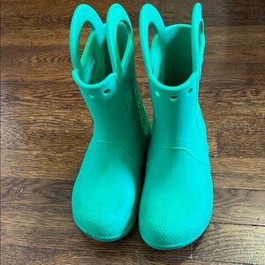 Kids Crocs rubber boots size 1. Some wear but lots of life in them.